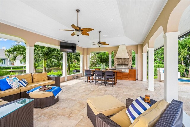 740 Lagoon Rd, Vero Beach, FL 32963 - view of patio with an outdoor living space, exterior kitchen, grilling area, outdoor dining area, and ceiling fan