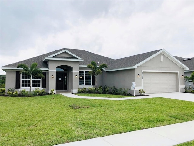 ranch-style house with a garage and a front yard