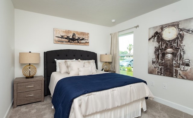 bedroom with light carpet