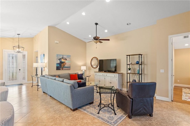 living area with baseboards, ceiling fan, light tile patterned flooring, high vaulted ceiling, and recessed lighting