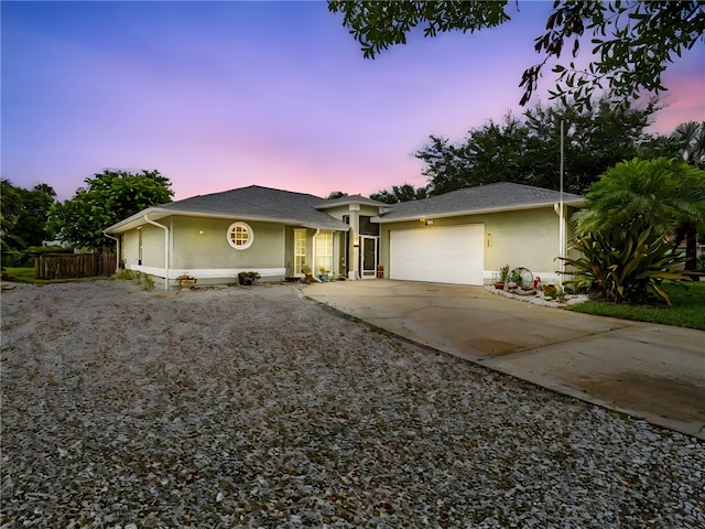 ranch-style home with a garage