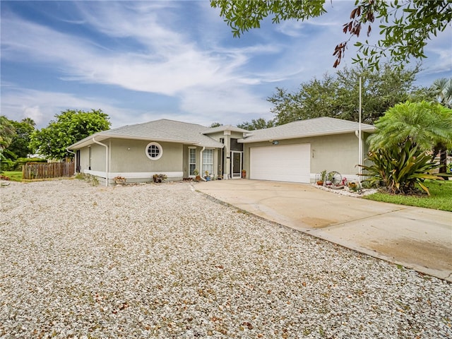 ranch-style home with a garage