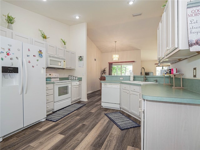 kitchen with dark hardwood / wood-style flooring, hanging light fixtures, sink, white cabinetry, and white appliances