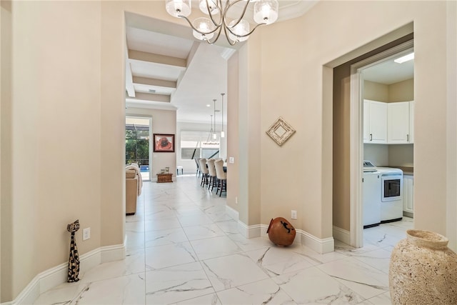 corridor with separate washer and dryer, beamed ceiling, and coffered ceiling