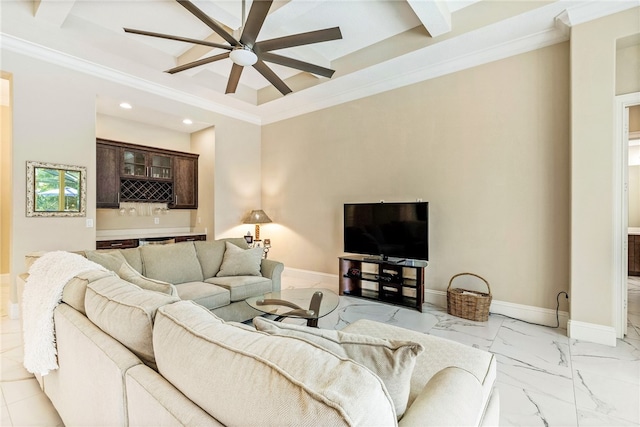 living room with ceiling fan and ornamental molding