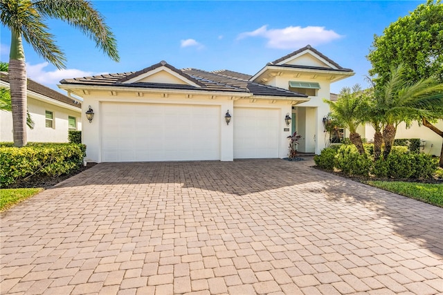 view of front of property featuring a garage