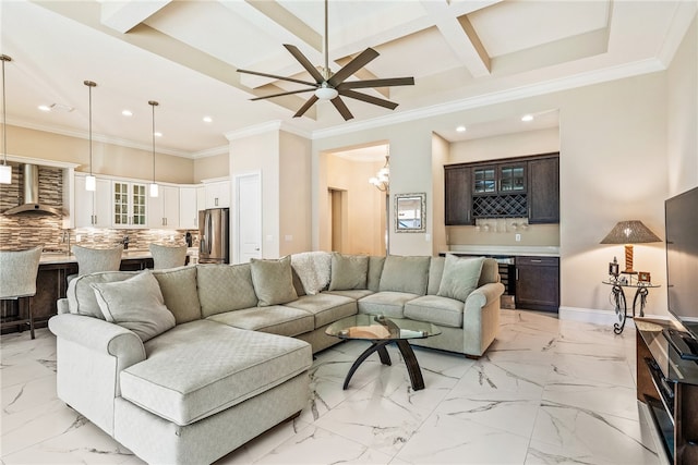 living room with beamed ceiling, ornamental molding, ceiling fan, and coffered ceiling