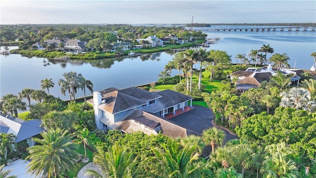 birds eye view of property featuring a water view