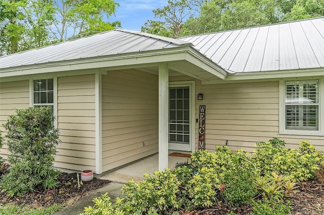 435 61st Ave, Vero Beach, FL 32968 - view of exterior entry featuring metal roof