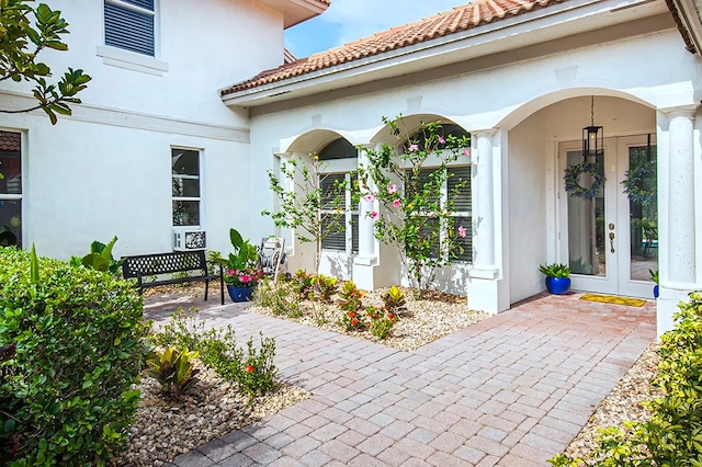 doorway to property featuring french doors