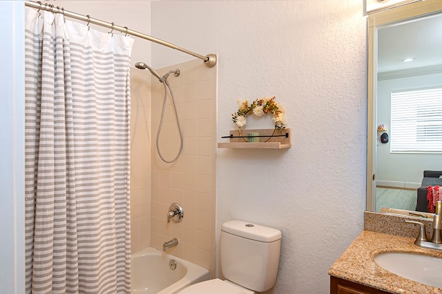 full bathroom featuring vanity, shower / bath combo, and toilet