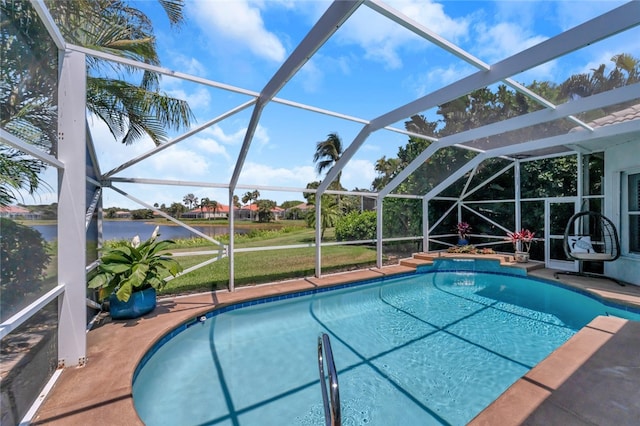 view of pool featuring a lanai, a water view, and a patio