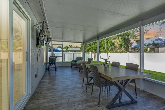 sunroom / solarium with plenty of natural light