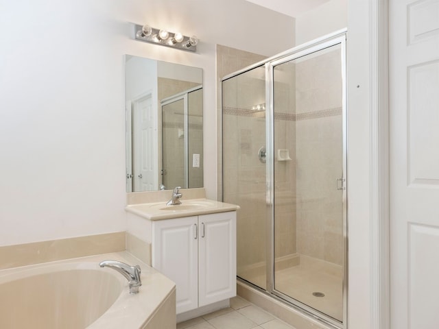 bathroom with shower with separate bathtub, tile patterned floors, and vanity