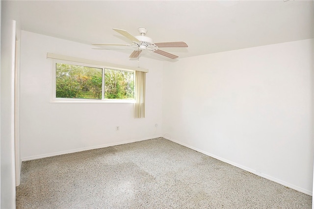 unfurnished room with ceiling fan