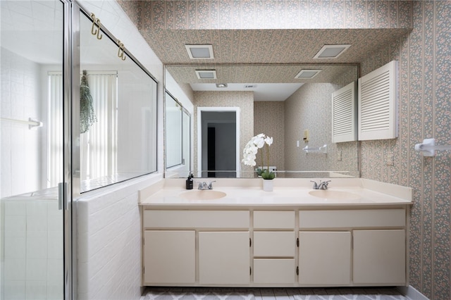 bathroom with vanity and walk in shower