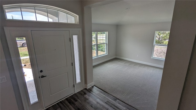 532 S Easy St, Sebastian, FL 32958 - carpeted entrance foyer with baseboards and wood finished floors