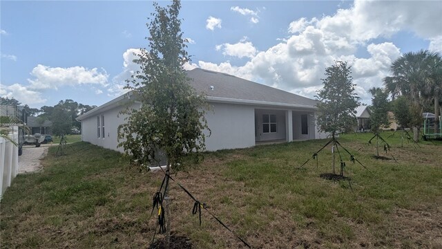 532 S Easy St, Sebastian, FL 32958 - back of house with stucco siding