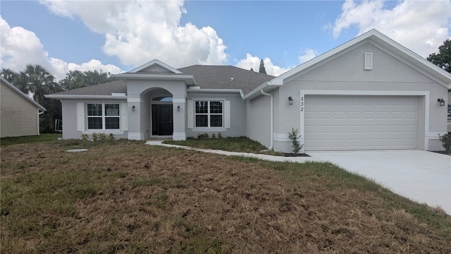 532 S Easy St, Sebastian, FL 32958 - ranch-style house featuring stucco siding, driveway, a front yard, and a garage