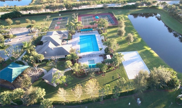 birds eye view of property featuring a water view