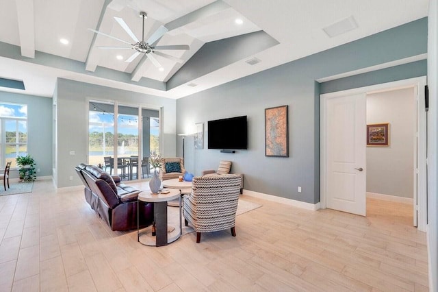 living room with light wood-type flooring, ceiling fan, and lofted ceiling