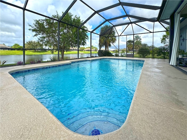 view of swimming pool featuring a patio area, a water view, and a lanai