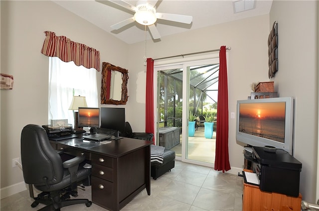 tiled home office with ceiling fan