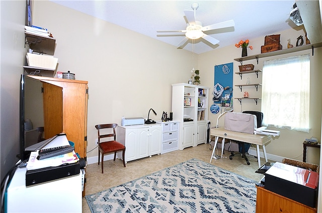 office area with ceiling fan and light tile patterned floors