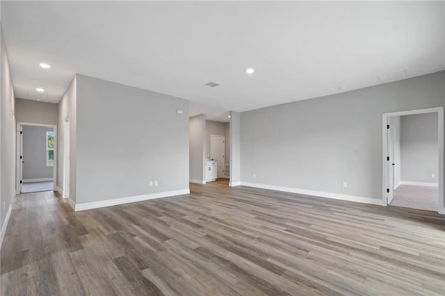 unfurnished room featuring light wood-type flooring