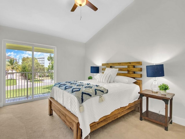 carpeted bedroom featuring ceiling fan, access to outside, and vaulted ceiling