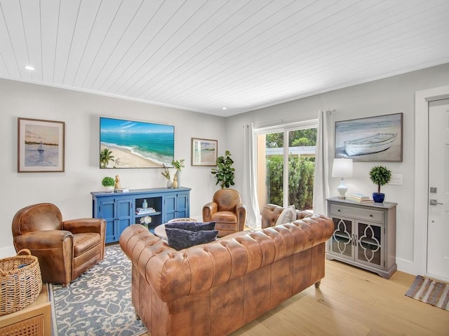 living room featuring light wood-type flooring and wooden ceiling