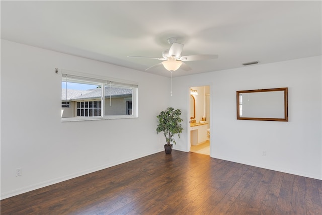 spare room featuring ceiling fan and hardwood / wood-style floors