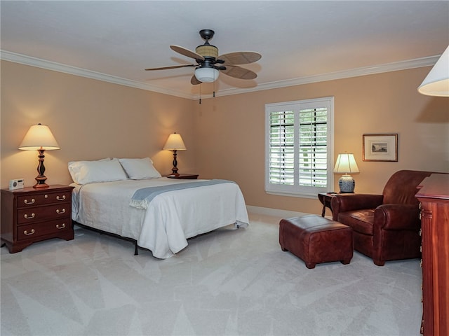 bedroom featuring ornamental molding, light carpet, and ceiling fan