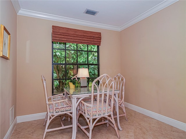 tiled dining area with ornamental molding