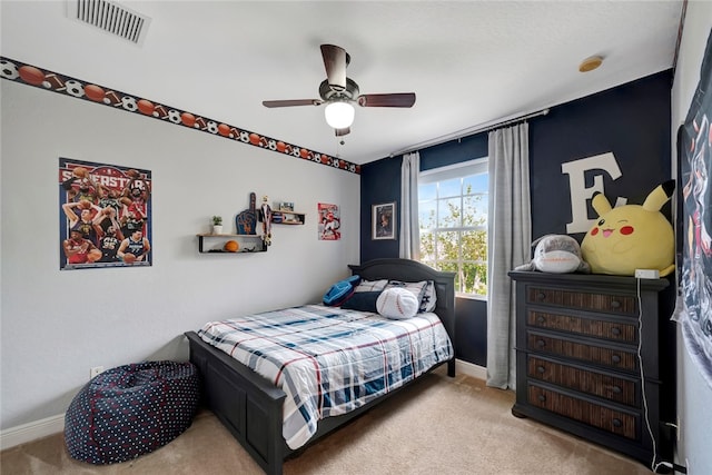 carpeted bedroom featuring ceiling fan