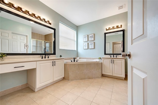 bathroom with vanity, tile patterned floors, and separate shower and tub