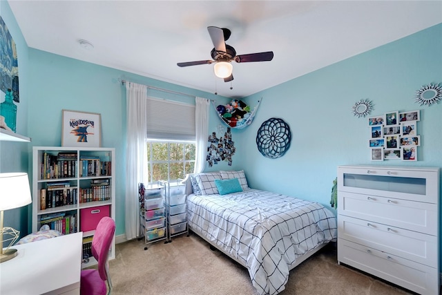 carpeted bedroom featuring ceiling fan