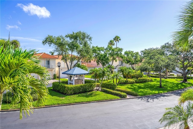 surrounding community featuring a lawn