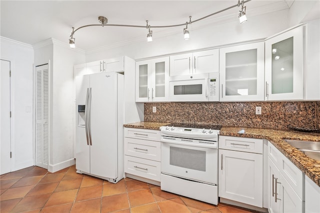 kitchen with white cabinets, white appliances, backsplash, and crown molding