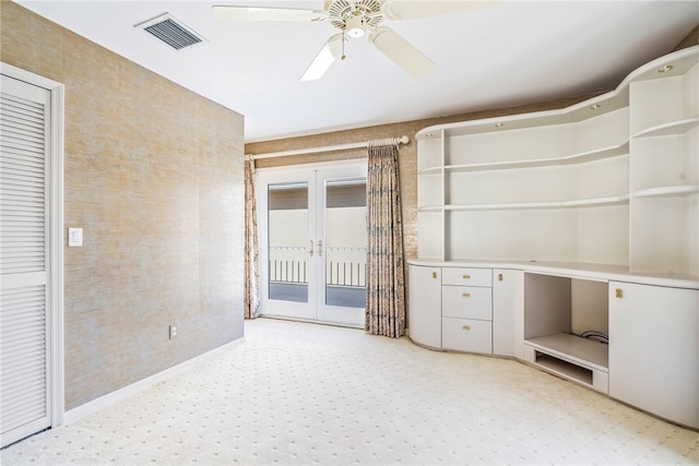 unfurnished bedroom featuring access to exterior, french doors, and ceiling fan