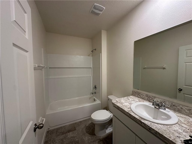 bathroom with bathtub / shower combination, toilet, vanity, and visible vents