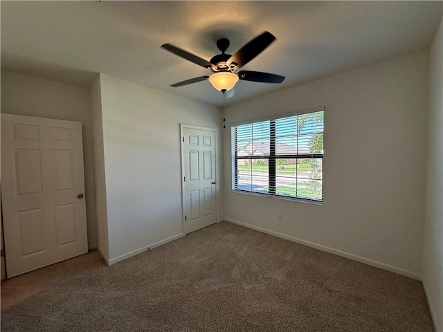 4131 Keeson Cir, Vero Beach, FL 32967 - unfurnished bedroom with carpet floors and ceiling fan