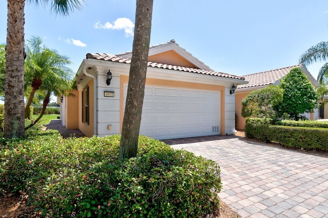 view of front of home with a garage