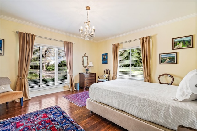 bedroom featuring dark hardwood / wood-style flooring, crown molding, and multiple windows