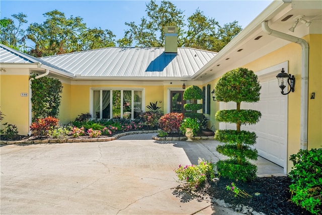 view of patio / terrace with a garage