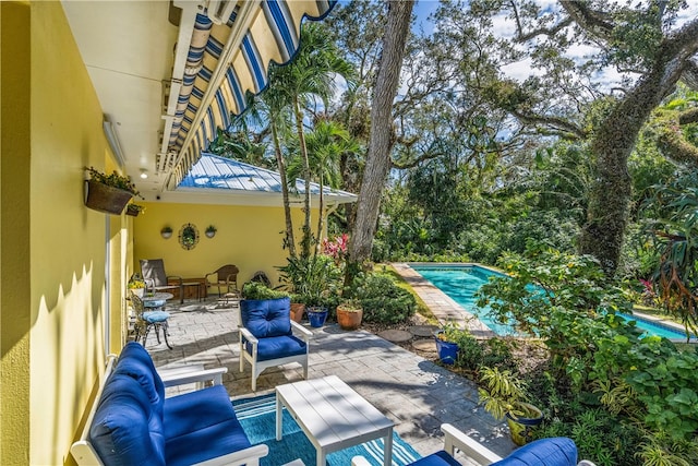 view of pool with a patio