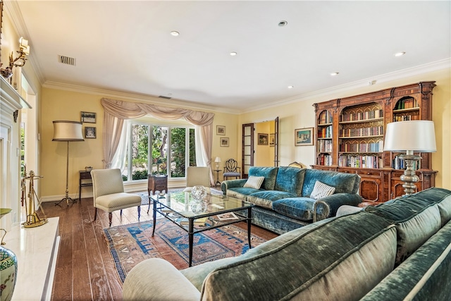 living room featuring a fireplace, dark hardwood / wood-style flooring, and ornamental molding