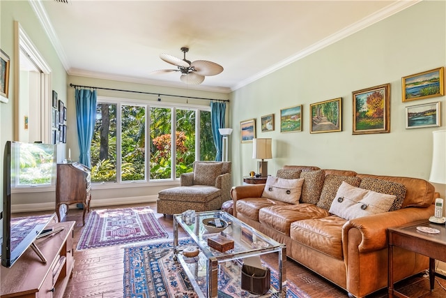 living room featuring ceiling fan, hardwood / wood-style floors, and crown molding