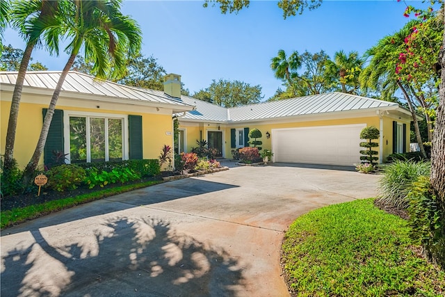 single story home with a garage