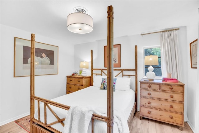 bedroom featuring light hardwood / wood-style floors